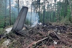 На месте крушения самолета Ан-24 нашли черные ящики